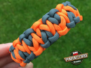 Bransoleta z Paracordu typ "King Two Face" z wplecioną plastikowa klamrą kolor "Gun Metal - Orange Yellow"