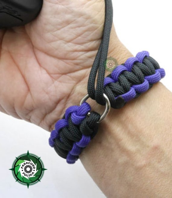 Pasek z oryginalnego Paracordu typ III 550 o siedmiu rdzeniach do aparatu, kamery, lornetki, dalomierza, typ splotu "Cobra", kolor "Black - purple"