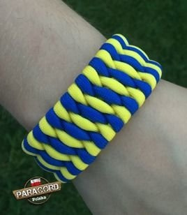 Bransoleta survivalowa z Paracordu typ "Extreme", z wplecioną metalową regulowaną szeklą, kolor: "Blue - Yellow"
