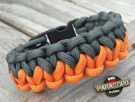 Bransoleta z Paracordu typ "Two Face" z wplecioną plastikową klamrą, kolor "Gun Metal - Orange Yellow"