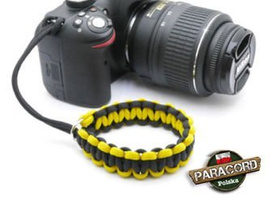 Pasek z oryginalnego Paracordu typ III 550 o siedmiu rdzeniach do aparatu, kamery, lornetki, dalomierza, typ splotu "Cobra", kolor "Black - yellow"