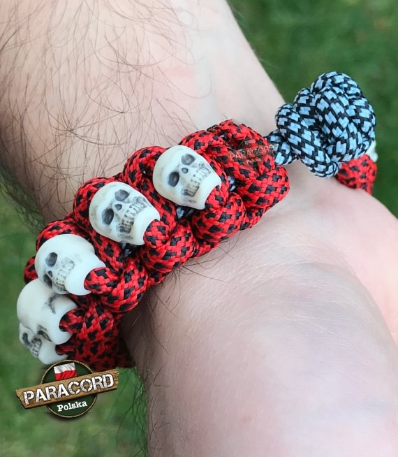 Bransoleta z Paracordu typ "Cobra Globe", z wplecionymi czaszkami, kolor: "Red Diamonds - Crystal Blue"