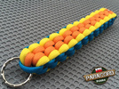 Brelok survivalowy z Paracordu 550 o splocie "Royal Box Knot", kolor: "Orange - Yellow - Blue"