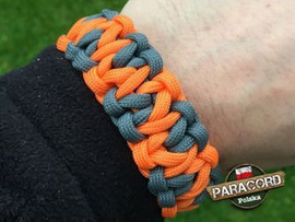 Bransoleta z Paracordu typ "King Two Face" z wplecioną plastikowa klamrą kolor "Gun Metal - Orange Yellow"