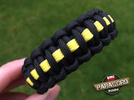 Bransoleta z Paracordu typ "Cobra Thin Yellow Line" z wplecioną plastikową klamrą