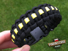 Bransoleta z Paracordu typ "Cobra Thin Yellow Line" z wplecioną plastikową klamrą