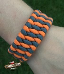 Bransoleta survivalowa z Paracordu typ "Extreme", z wplecioną metalową regulowaną szeklą, kolor: "Orange yellow - Gun metal"